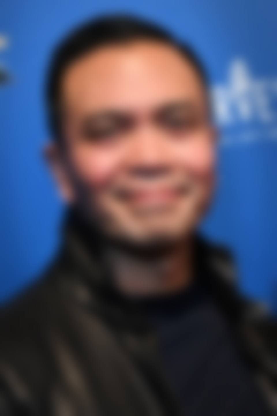 Jose Llana, blurred
